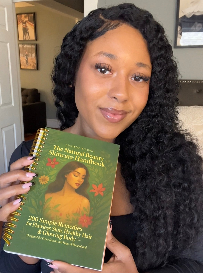Yolanda holding the Handbook
