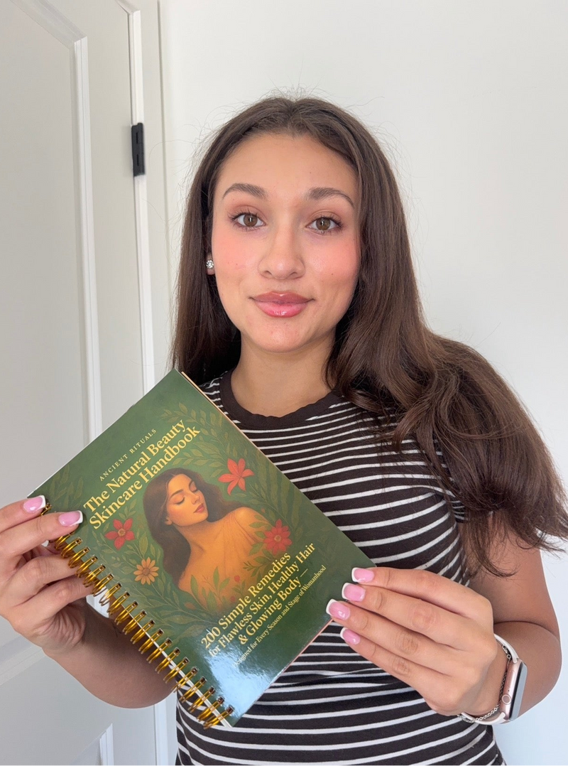 Vanessa holding the Handbook